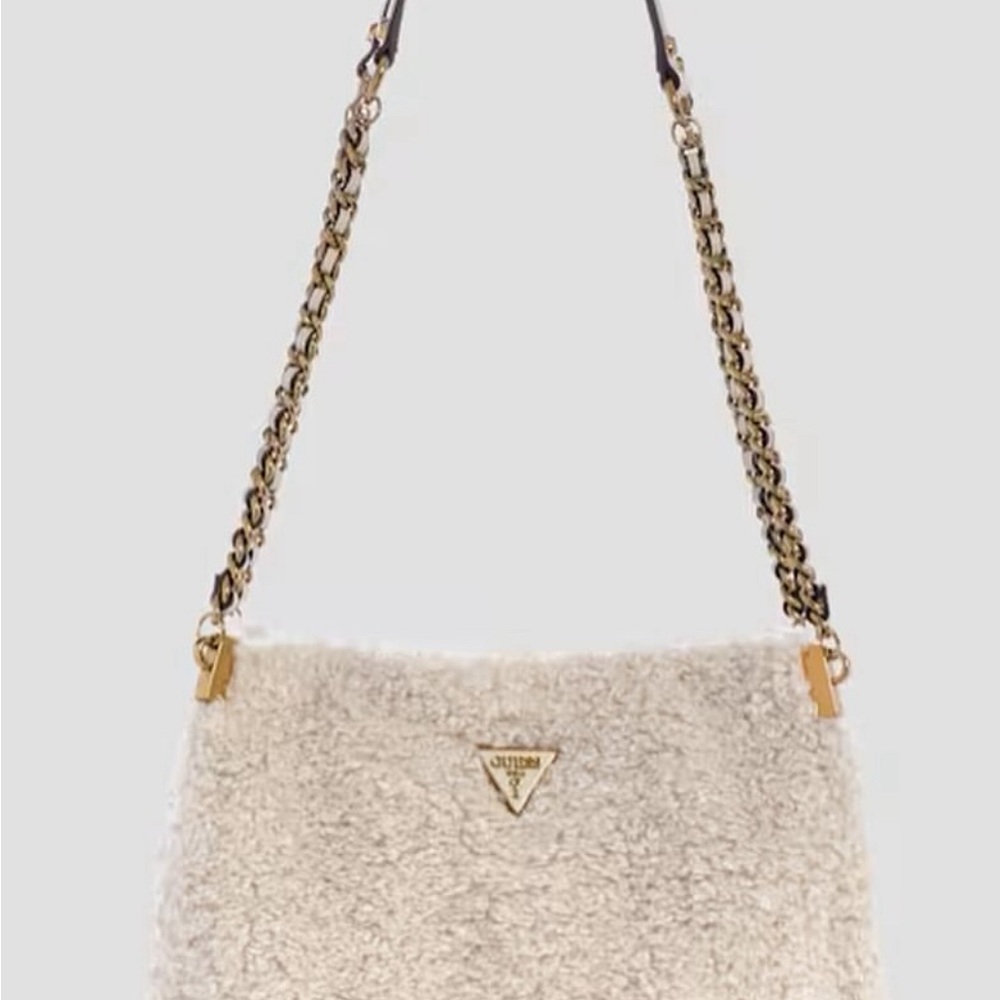 Cute blush color guess shoulder bag.